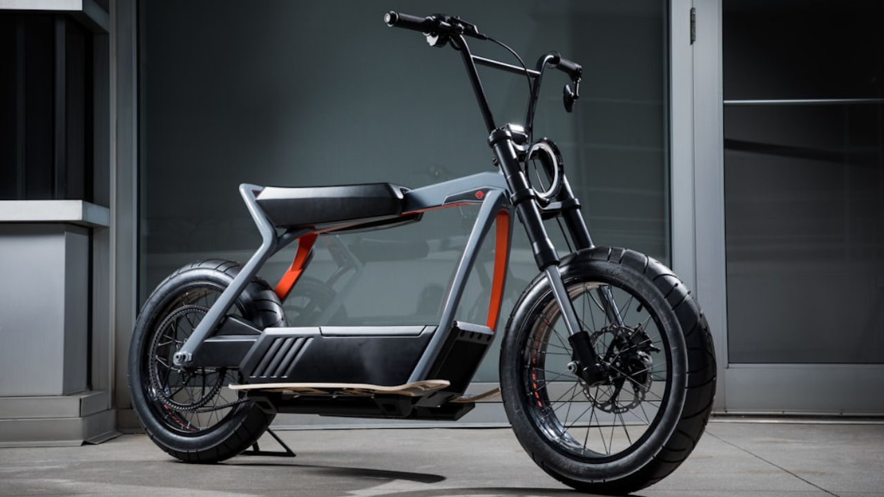 Modern electric bike parked on a city street, showcasing its sleek design and built-in battery.